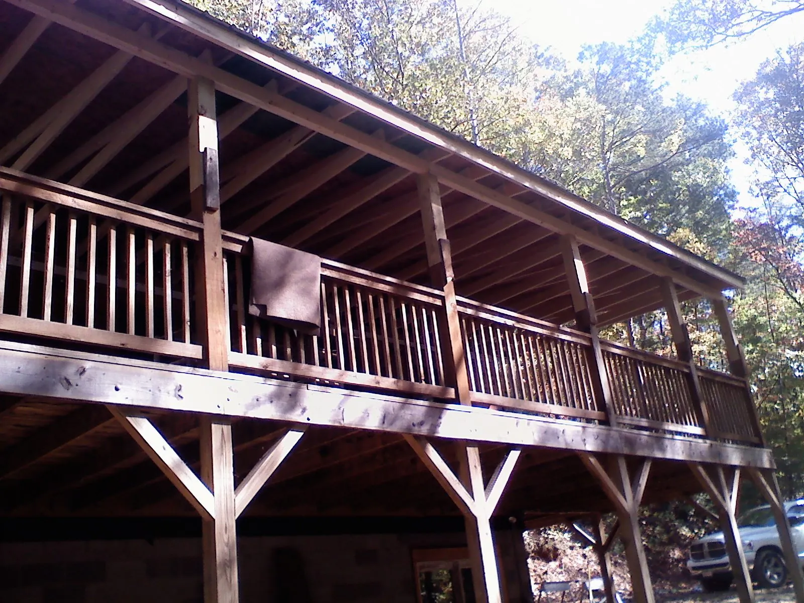 Timber framing under a new elevated porch and deck — Roof Leak Repair in Ferris by Roofing Brothers